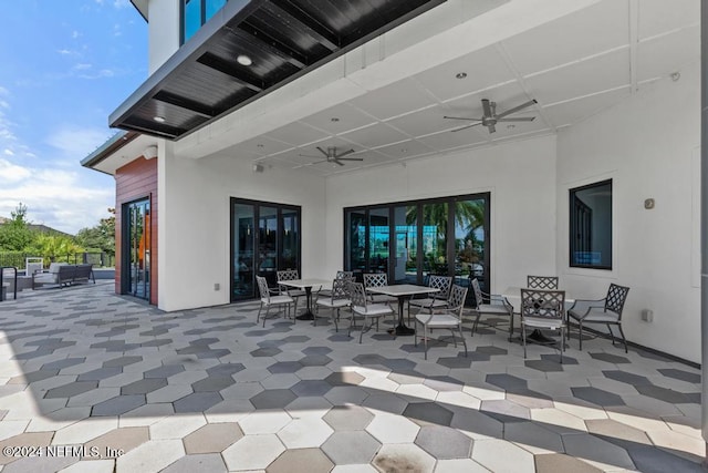 view of patio featuring outdoor lounge area and ceiling fan