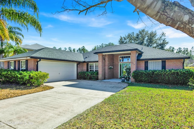 ranch-style house with a garage and a front yard