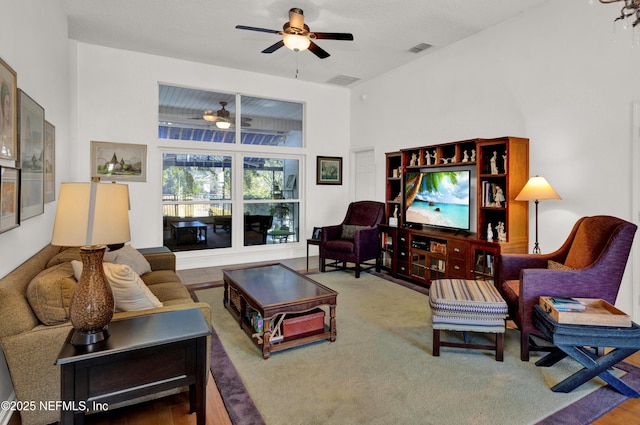 living room with ceiling fan