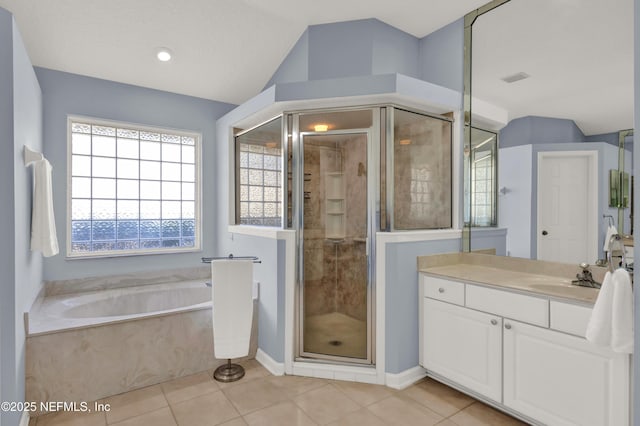 bathroom with tile patterned floors, shower with separate bathtub, vaulted ceiling, and vanity