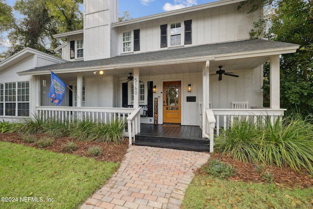 view of front of property featuring ceiling fan and a porch