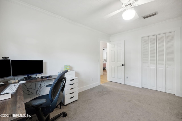 office area featuring light colored carpet, ceiling fan, and ornamental molding