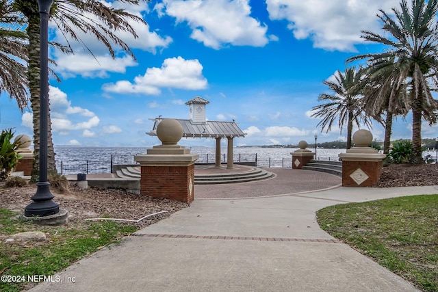 view of home's community with a water view