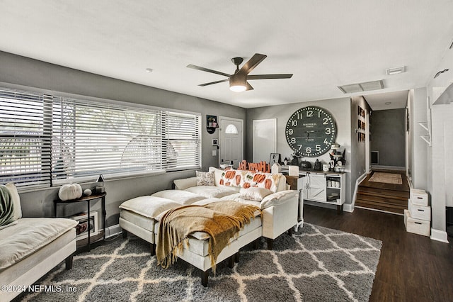 bedroom featuring ceiling fan and dark hardwood / wood-style floors