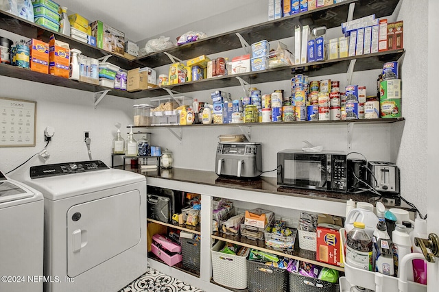 pantry with separate washer and dryer