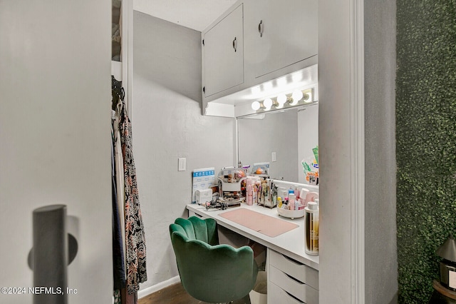 bathroom with hardwood / wood-style flooring