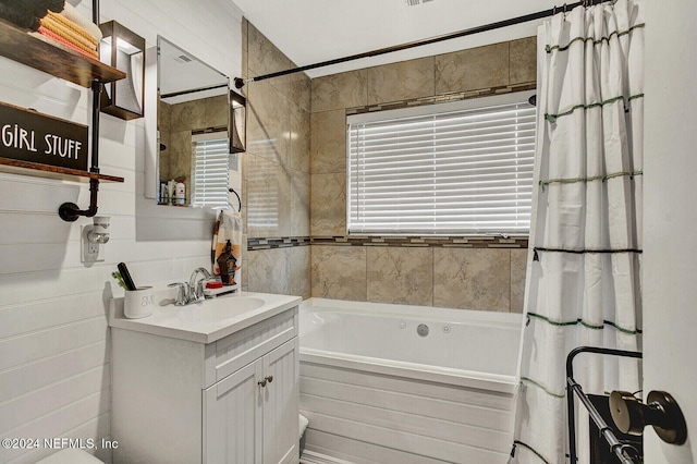 bathroom with vanity and shower / tub combo