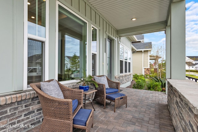 view of patio featuring a porch