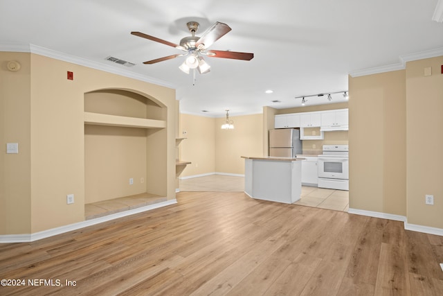 unfurnished living room featuring ceiling fan with notable chandelier, crown molding, light wood-type flooring, and built in shelves