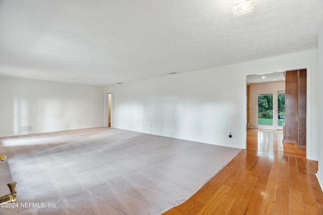 unfurnished room featuring light wood-type flooring