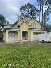 view of front facade with a front yard