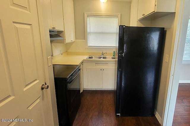 kitchen featuring black appliances, dark hardwood / wood-style floors, and white cabinets