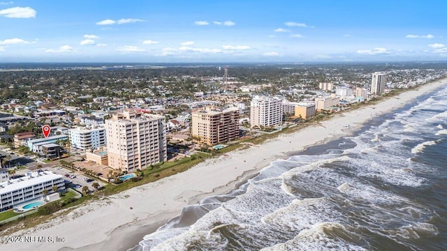 bird's eye view with a beach view and a water view