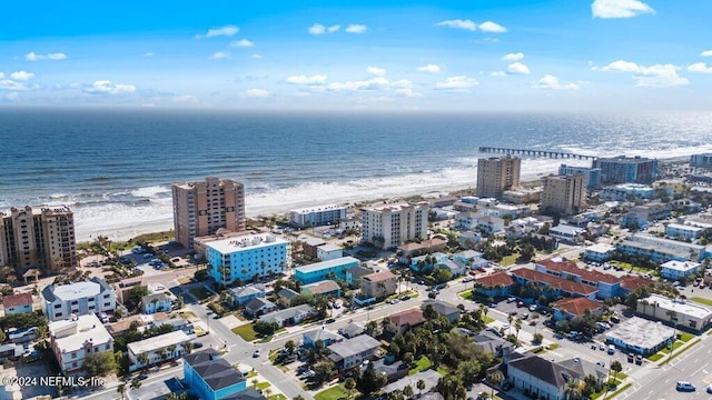 aerial view featuring a beach view and a water view