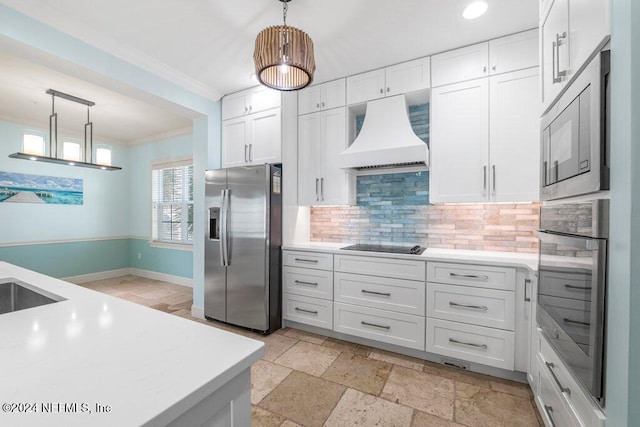 kitchen with custom exhaust hood, appliances with stainless steel finishes, crown molding, and light countertops