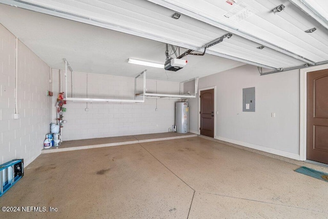 garage featuring water heater, a garage door opener, and electric panel