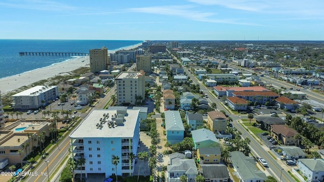 bird's eye view with a beach view and a water view