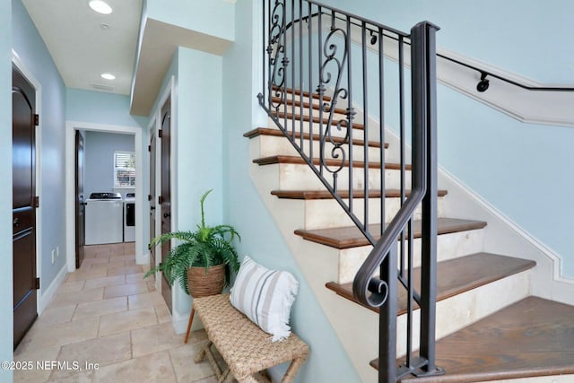 staircase with recessed lighting, visible vents, and washer and clothes dryer