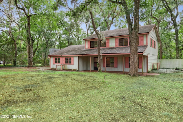 view of front of home with a front lawn