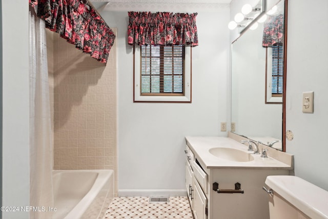 300 Raintree Trl, Saint Augustine, FL 32086 - bathroom with toilet, vanity, shower / bath combo with shower curtain, and baseboards