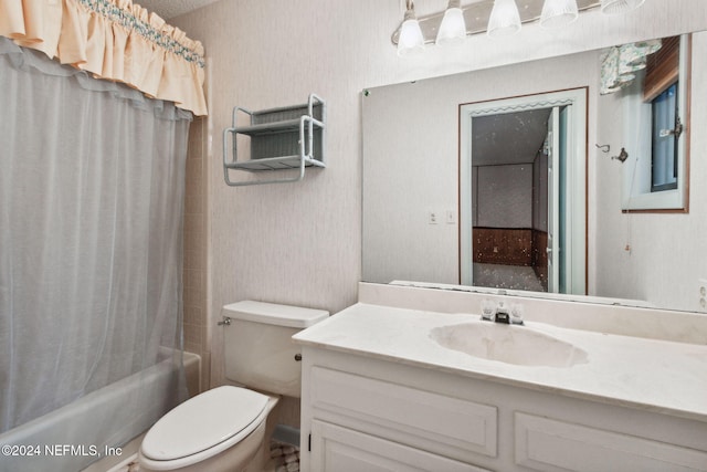 full bathroom featuring shower / bath combination with curtain, vanity, and toilet