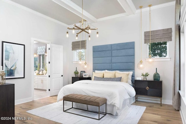 bedroom featuring ensuite bathroom, light hardwood / wood-style floors, ornamental molding, and beam ceiling