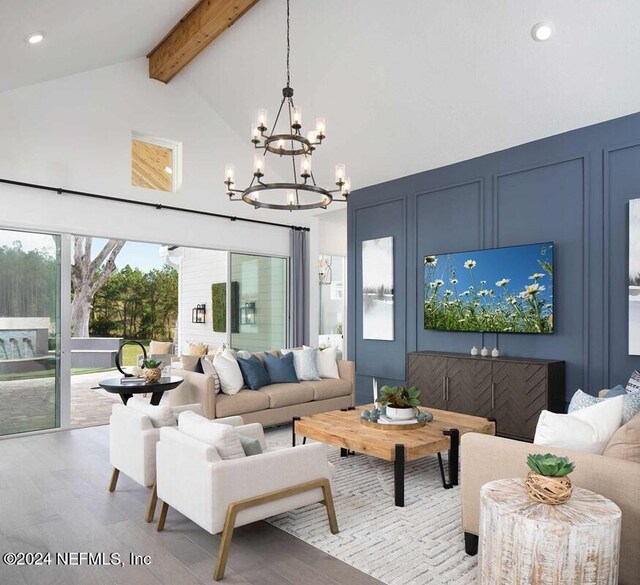 55 Sparrow Crk Dr, Saint Augustine, FL 32092 - living room featuring a chandelier, beamed ceiling, wood finished floors, recessed lighting, and high vaulted ceiling