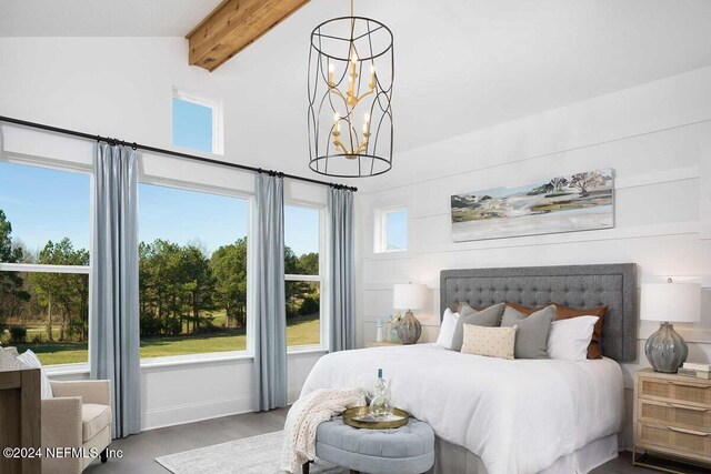 bedroom with vaulted ceiling with beams, hardwood / wood-style flooring, and an inviting chandelier