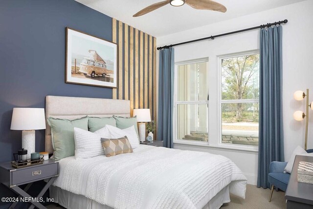 55 Sparrow Crk Dr, Saint Augustine, FL 32092 - carpeted bedroom featuring a ceiling fan, wallpapered walls, and baseboards