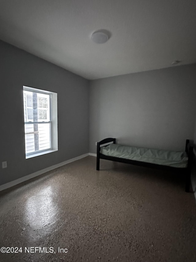 2122 Ashland St, Jacksonville, FL 32207 - unfurnished bedroom featuring baseboards