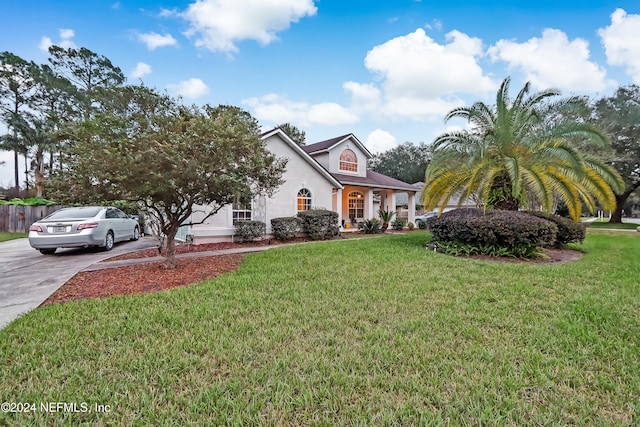 view of front of house with a front lawn