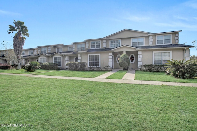 view of front of home with a front yard