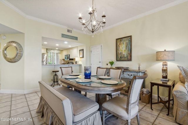 tiled dining area with a notable chandelier and ornamental molding