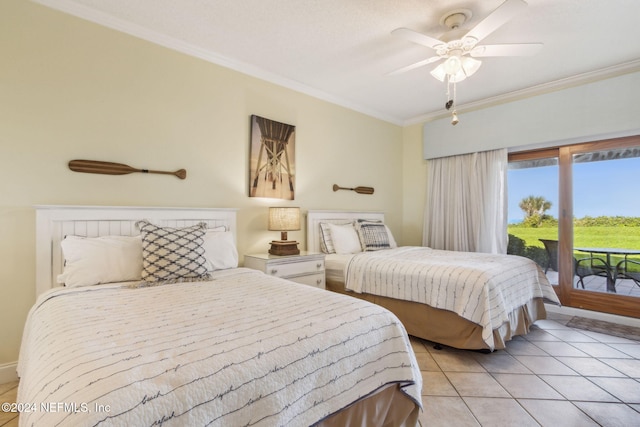 tiled bedroom with ornamental molding, access to outside, and ceiling fan