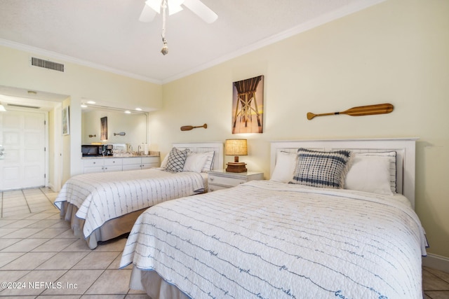 tiled bedroom featuring ornamental molding and ceiling fan