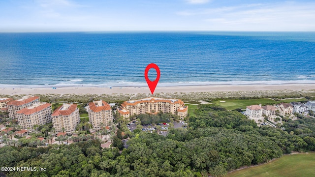 aerial view featuring a view of the beach and a water view