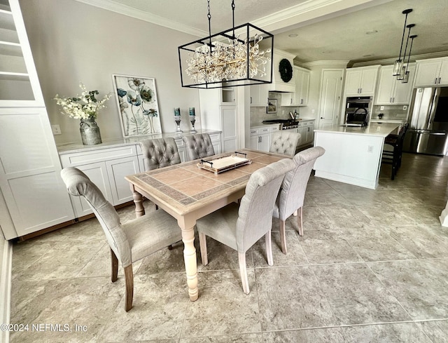 dining area with ornamental molding and a textured ceiling