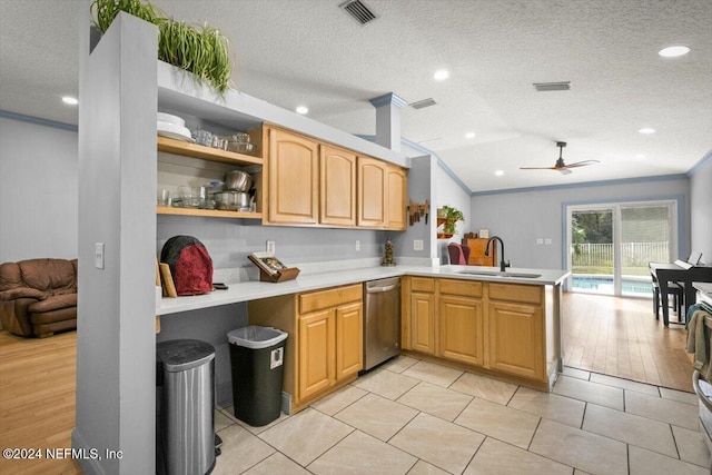 kitchen featuring dishwasher, lofted ceiling, sink, light wood-type flooring, and kitchen peninsula