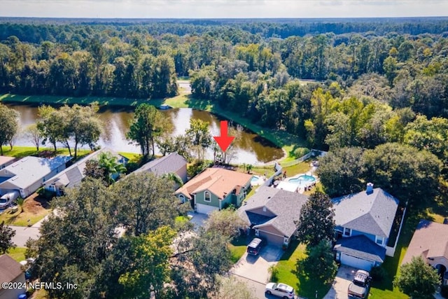 birds eye view of property featuring a water view