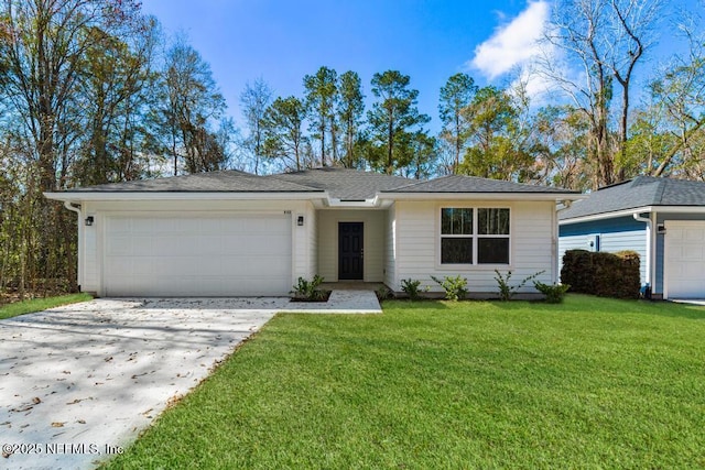 ranch-style home featuring a garage and a front yard