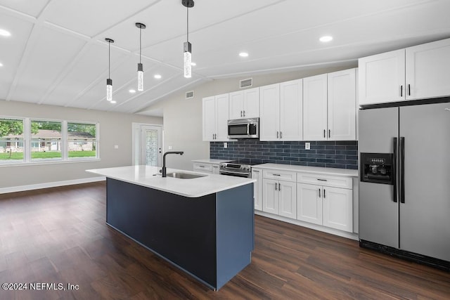 kitchen with lofted ceiling, sink, dark hardwood / wood-style flooring, white cabinetry, and stainless steel appliances