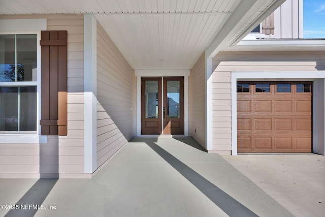 property entrance featuring french doors