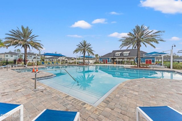 view of swimming pool featuring a patio