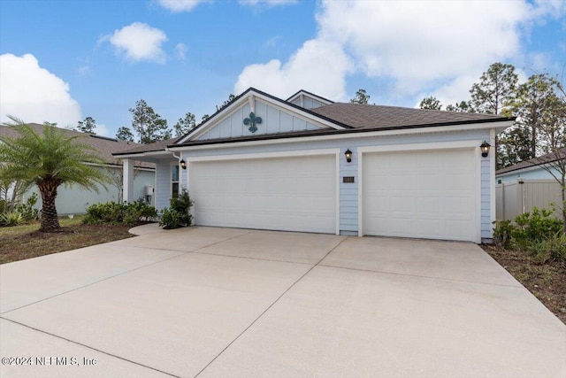 ranch-style house featuring a garage