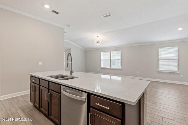 kitchen featuring a healthy amount of sunlight, light hardwood / wood-style floors, a center island with sink, and stainless steel dishwasher