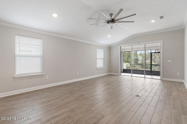 unfurnished room with light wood-type flooring, lofted ceiling, ceiling fan, and crown molding