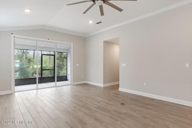 spare room featuring ceiling fan, light wood-type flooring, lofted ceiling, and ornamental molding