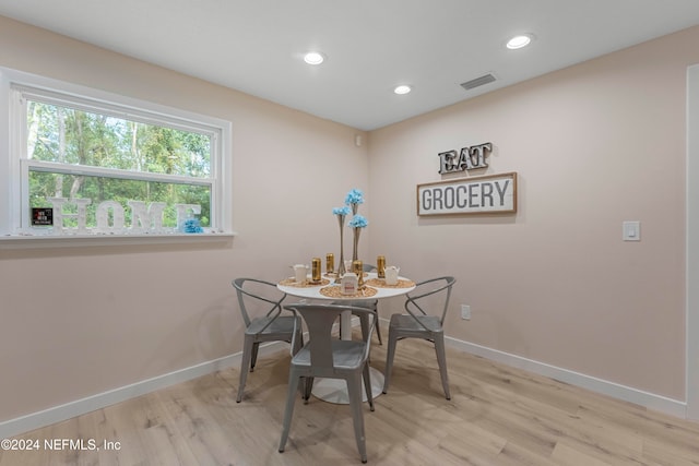 dining area with light wood-type flooring