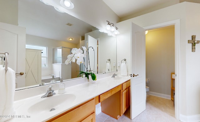 full bathroom with toilet, vanity, tile patterned floors, and independent shower and bath