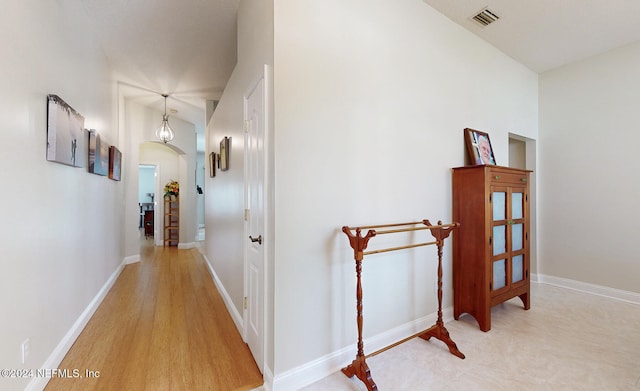 hallway featuring light hardwood / wood-style flooring